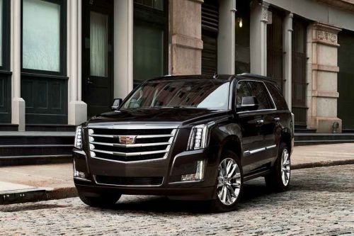 cadillac escalade cars of dubai luxury car rentals.jpeg